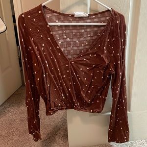 Orange and white polka dot blouse